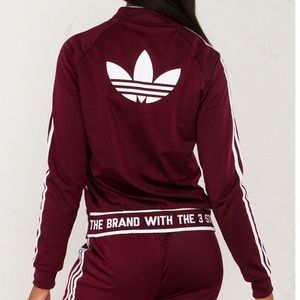 the brand with three stripes jacket